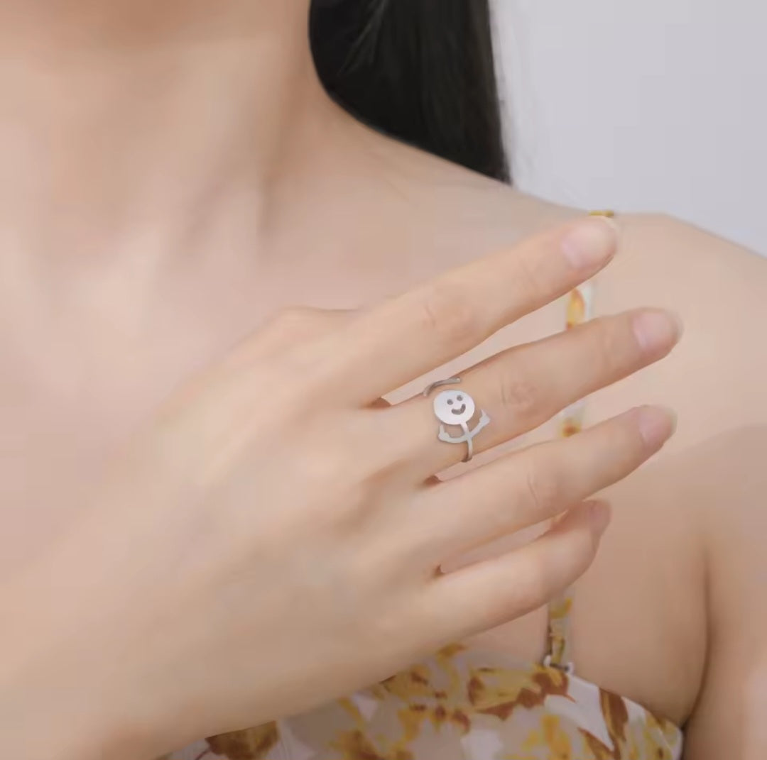 Stickman-Mittelfingerring an der Seite