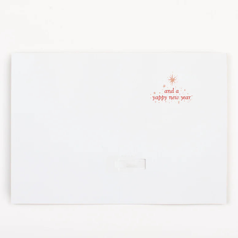 Carte "Joyeux Noël" chien qui chante sans fin et paillettes