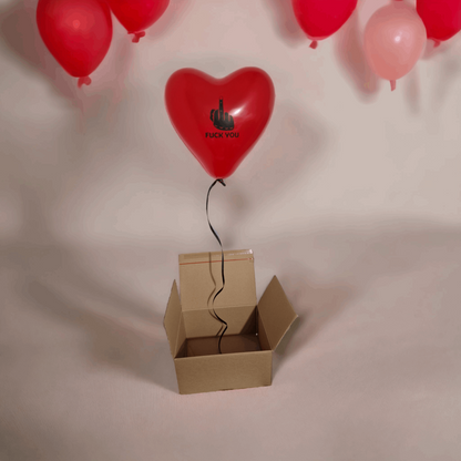 Box surprise ballon en forme de cœur rouge doigt d'honneur