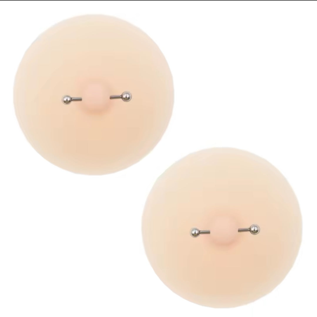 Nipple covers with piercing