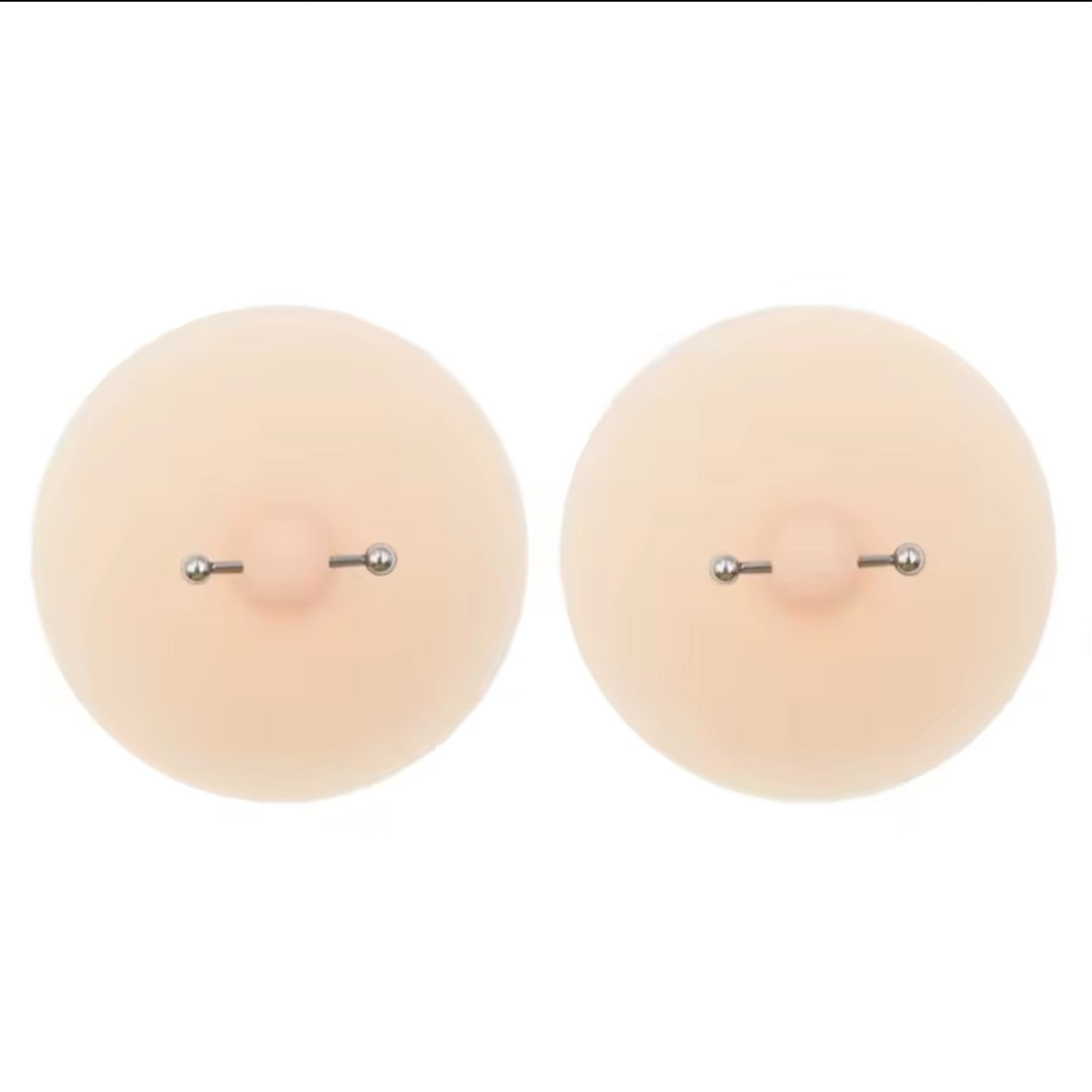 Nipple covers with piercing