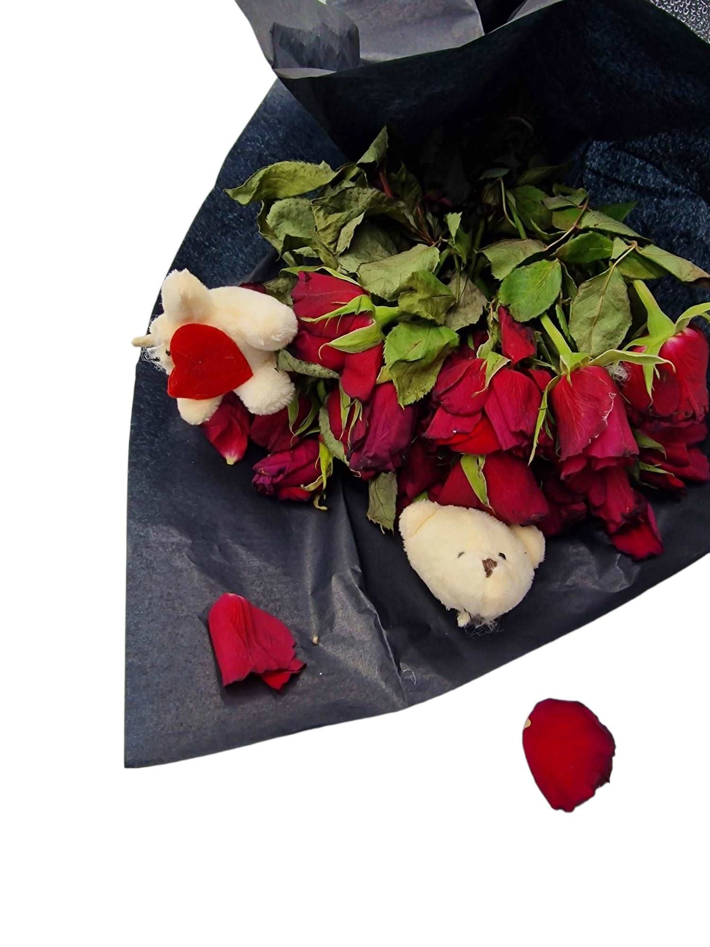 Bouquet de roses rouges fanées